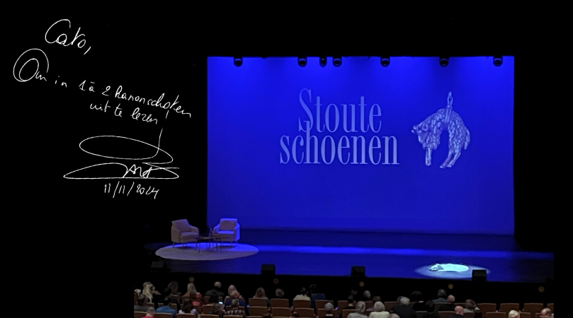 foto's van de lezing en een handtekening 