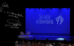 foto's van de lezing en een handtekening 